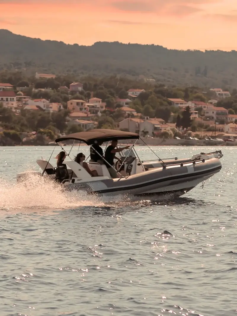 Marlin 23s RIB on the Ionian Sea at golden hour sunset